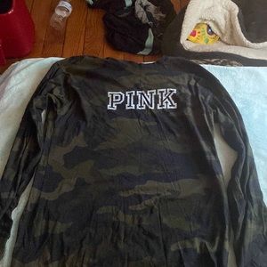 It a cute pink shirt with long sleeve